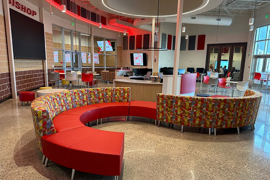 A curved couch in a student common area