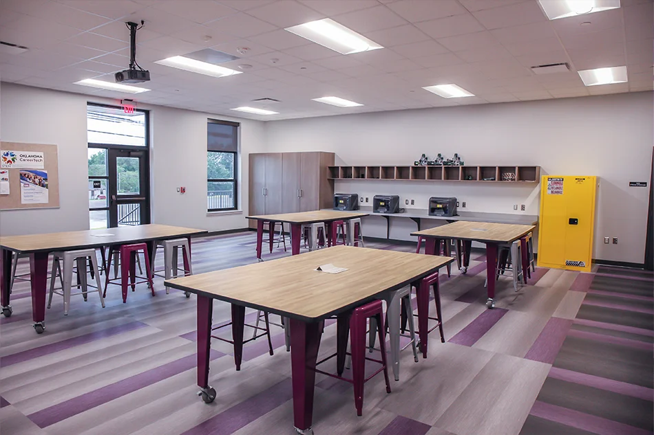 A lab setup with group tables and stools