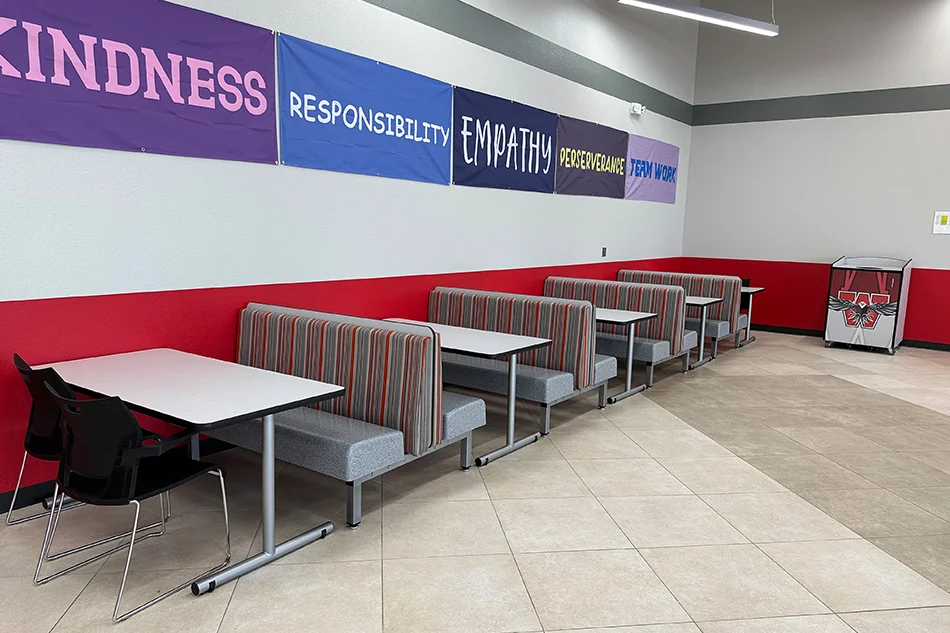 A row of booths for students to sit in at school