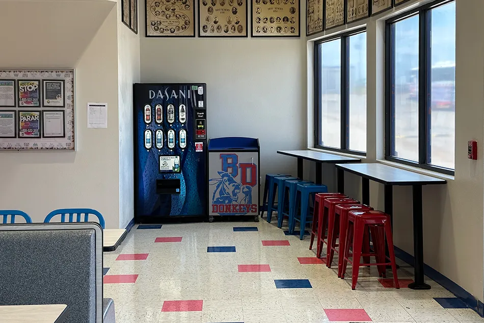 Group tables with silver stools in a lab