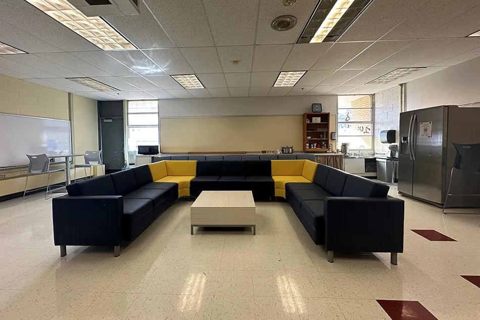 Group tables with silver stools in a lab