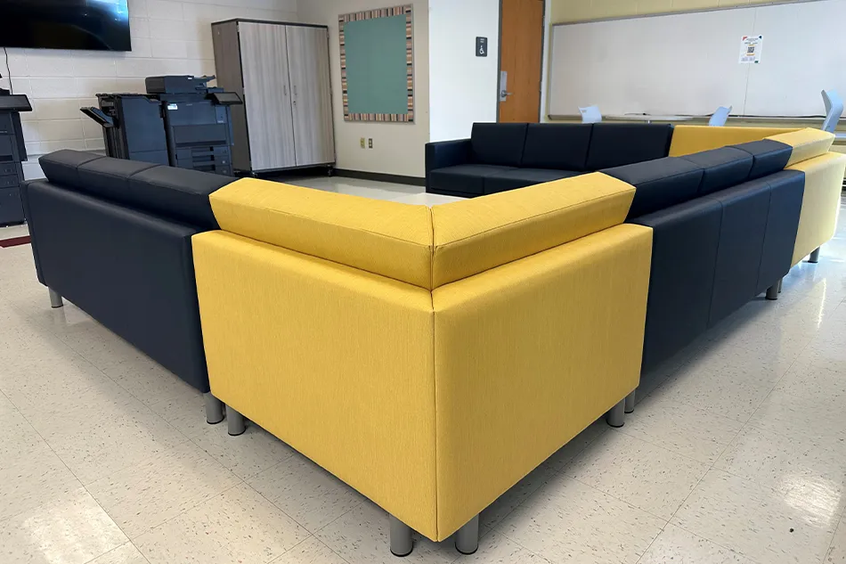 A curved couch in a student common area