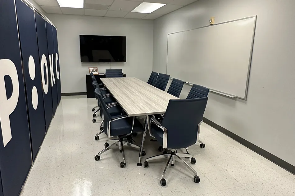 Group tables with silver stools in a lab