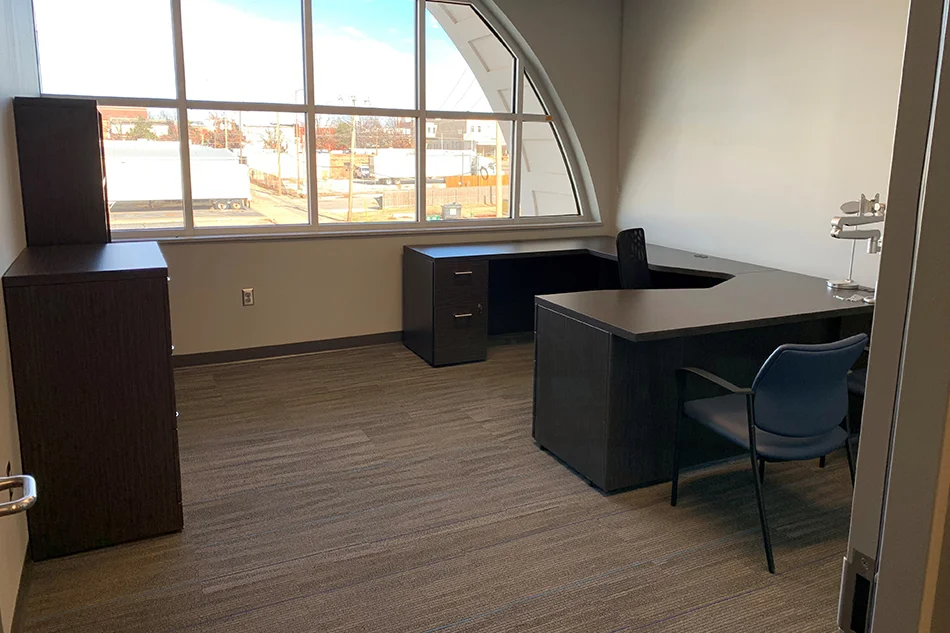 Group tables with silver stools in a lab