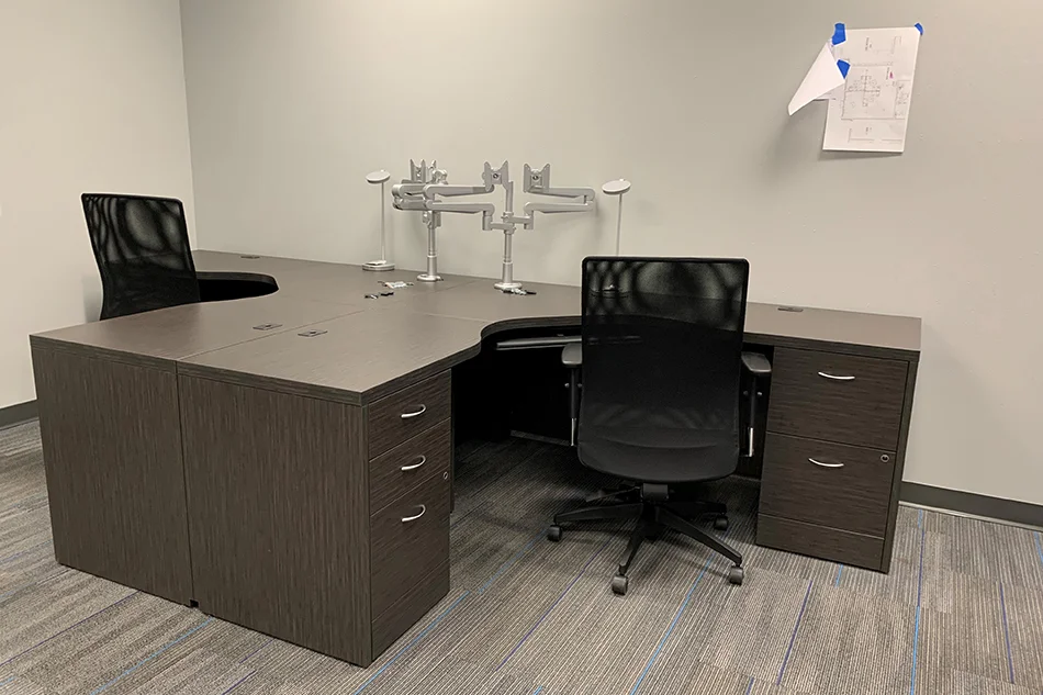 Group tables with silver stools in a lab