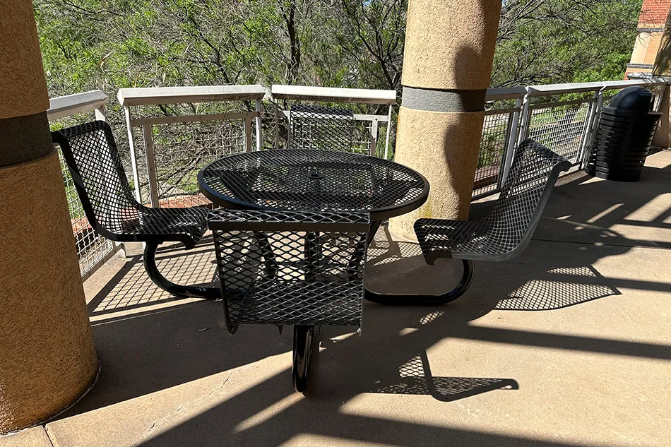 Group tables with silver stools in a lab