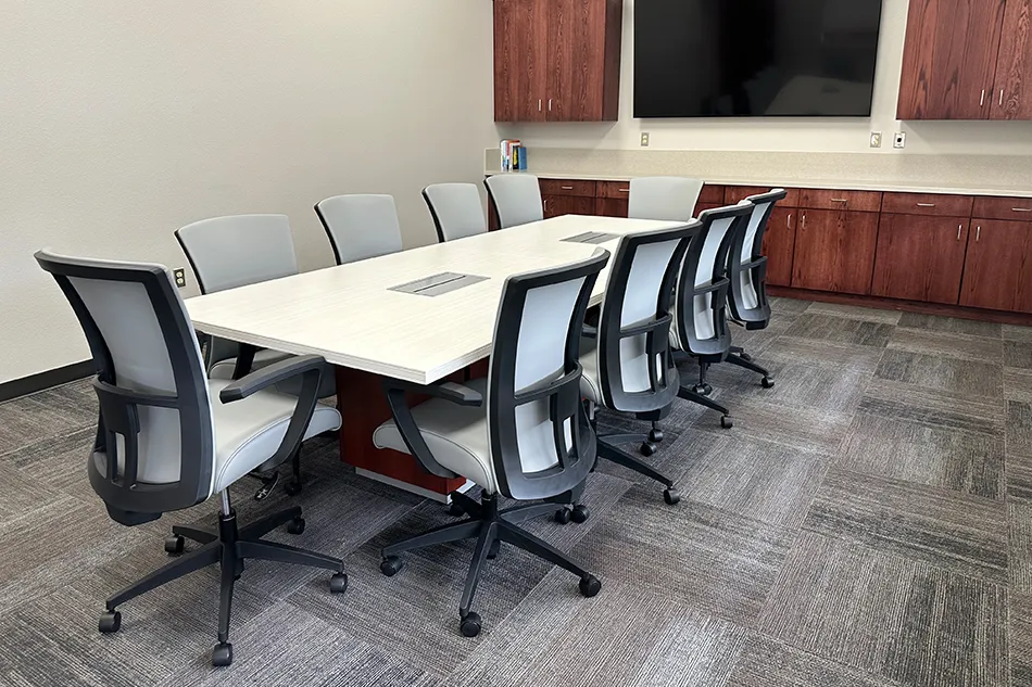 Group tables with silver stools in a lab