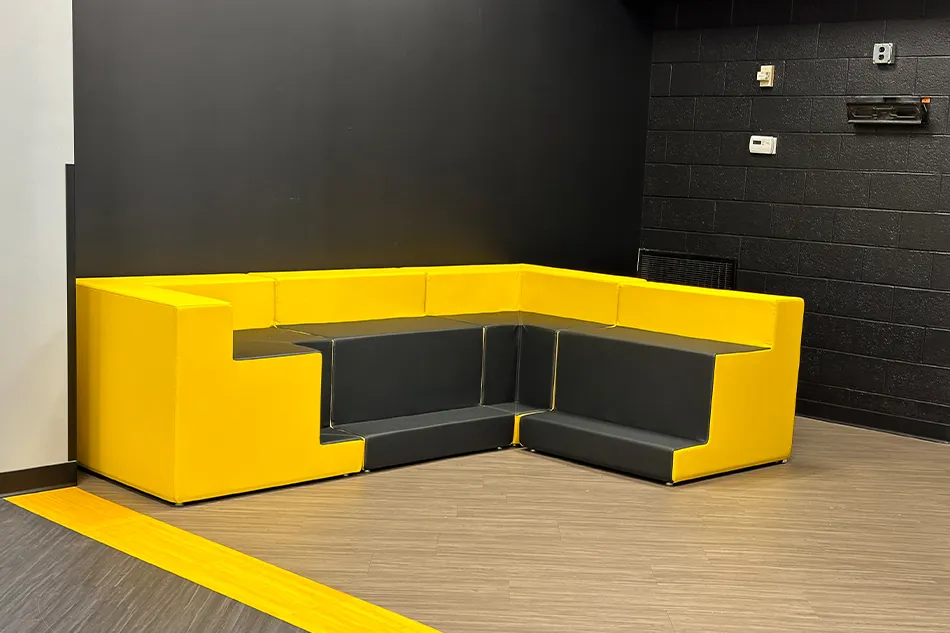 Group tables with silver stools in a lab