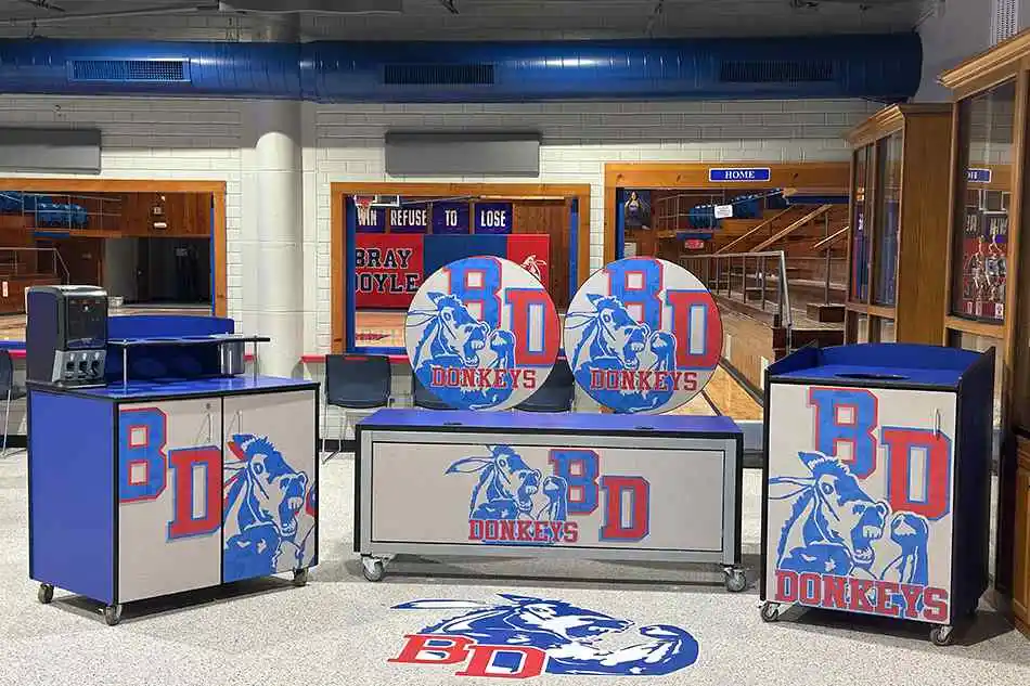 Multiple chairs with small tables in a common area