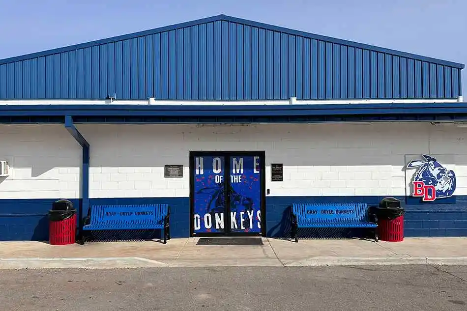 Group tables with silver stools in a lab