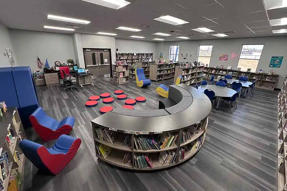 Group tables with silver stools in a lab